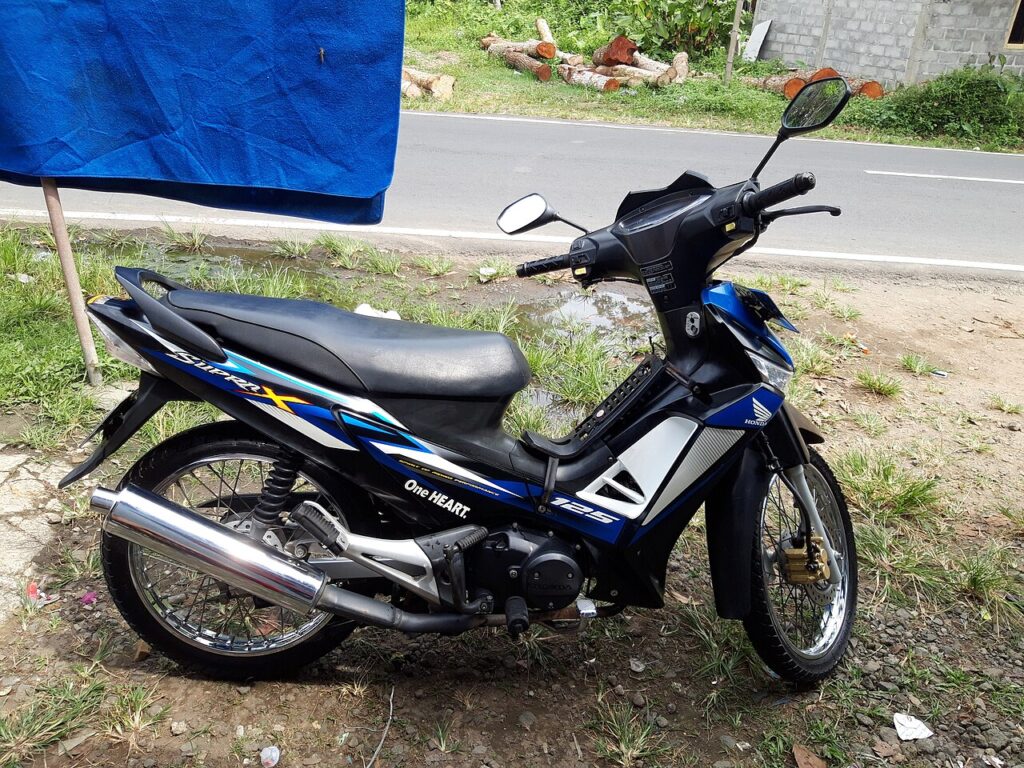 Pengereman Supra 125 Tetap Stabil Saat Harus Berhenti Mendadak, Harian Jadi Lebih Aman